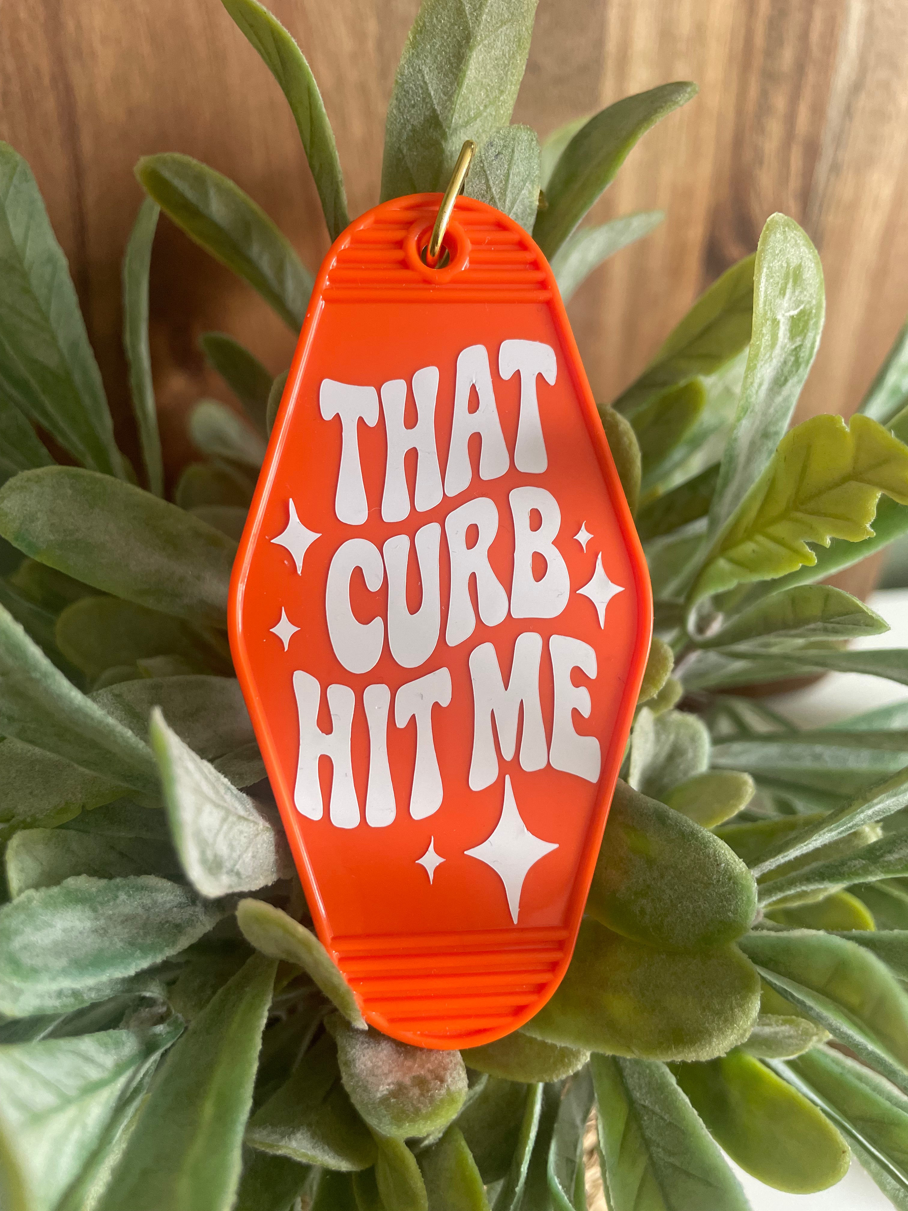 Sarcastic “That Curb Hit Me” Motel Keyring